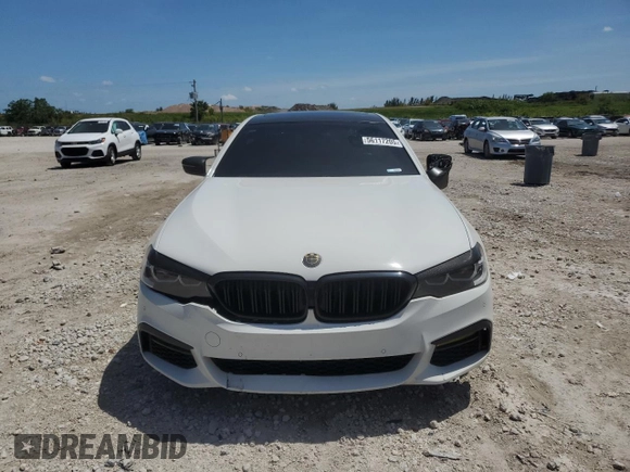 2018 BMW 5 Series 540i with VIN WBAJE5C58JWA96615, listed as a Copart auction lot 56117205 with 87,211 mi miles and Salvage title. Bid and sale history available at DreamBid. Image 5.