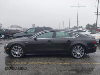 2014 Audi A7 3.0 Prestige with VIN WAU2GAFC5EN090233, listed as a IAAI auction lot 41565942 with 199,890 mi miles. Bid and sale history available at carsss.com. Image 15.
