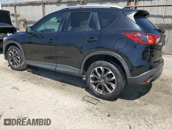 2016 Mazda CX-5 Grand Touring with VIN JM3KE2DY9G0777073, listed as a Copart auction lot 54200265 with 110,121 mi miles and Salvage Title. Bid and sale history available at carsss.com. Image 2.