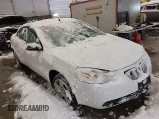 2009 Pontiac G6 w/1SA *Ltd Avail* with VIN 1G2ZG57B094141667, listed as a IAAI auction lot 41584261 with 100,702 mi miles. Bid and sale history available at carsss.com. Image 1.