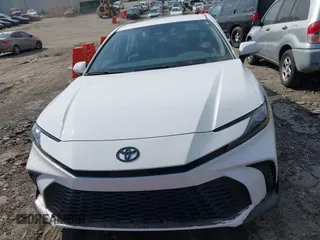 2025 Toyota Camry LE with VIN 4T1DAACK9SU084957, listed as a IAAI auction lot 41688859 with 7,396 mi miles and . Bid and sale history available at DreamBid. Image 12.