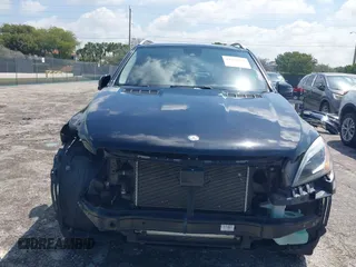 2015 Mercedes-Benz M 400 with VIN 4JGDA5GB4FA559004, listed as a IAAI auction lot 41932299 with 84,749 mi miles and . Bid and sale history available at DreamBid. Image 6.