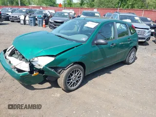 2002 Ford Focus ZX5 z VIN 3FAFP373X2R130965, wystawiony jako IAAI lot #42216638 z przebiegiem 59 236 mil mil oraz . Historia ofert i sprzedaży dostępna na DreamBid. Obrazek 2.