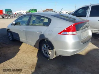 2010 Honda Insight EX with VIN JHMZE2H72AS037514, listed as a IAAI auction lot 41041101 with 193,872 mi miles. Bid and sale history available at carsss.com. Image 3.
