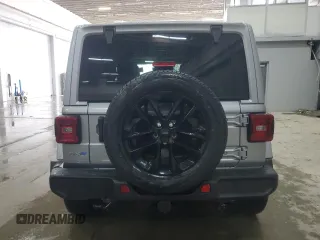 2021 Jeep Wrangler Unlimited Sahara with VIN 1C4JJXP65MW682462, listed as a Copart auction lot 58673385 with 38,714 mi miles and Salvage title. Bid and sale history available at DreamBid. Image 6.