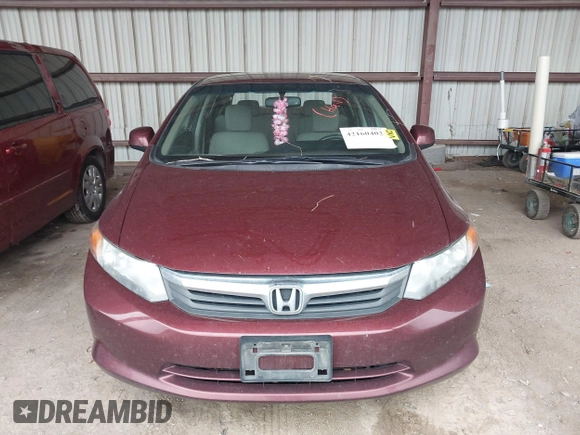 2012 Honda Civic LX z VIN 2HGFB2F50CH596442, wystawiony jako IAAI lot #42160402 z przebiegiem 130 152 mil mil oraz . Historia ofert i sprzedaży dostępna na DreamBid. Obrazek 12.