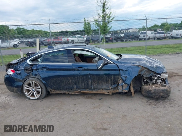 2016 BMW 4 Series 428i with VIN WBA4A9C52GGL88003, listed as a IAAI auction lot 42225642 with 105,054 mi miles and . Bid and sale history available at DreamBid. Image 13.
