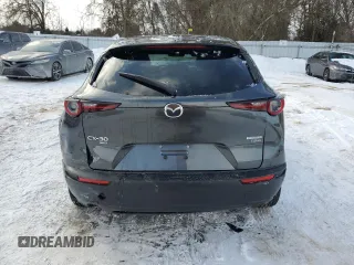 2024 Mazda CX-30 Premium z VIN 3MVDMBDYXRM646995, wystawiony jako Copart lot #89282365 z przebiegiem 4049 mil mil oraz Szkoda całkowita • Salvage title. Historia ofert i sprzedaży dostępna na DreamBid. Obrazek 6.