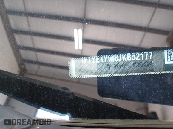 2018 Ford Transit with VIN 1FTYE1YM8JKB52177, listed as a IAAI auction lot 42564689 with 169,859 mi miles and . Bid and sale history available at DreamBid. Image 22.