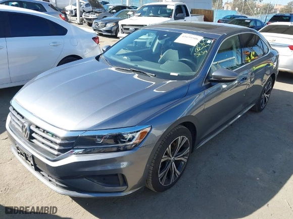 2020 Volkswagen Passat 2.0T SEL with VIN 1VWCA7A30LC025234, listed as a IAAI auction lot 41699506 with 49,117 mi miles. Bid and sale history available at carsss.com. Image 2.