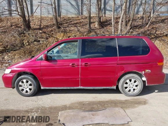 2003 Honda Odyssey EX-L with VIN 5FNRL18923B130410, listed as a IAAI auction lot 41814211 with 209,335 mi miles and . Bid and sale history available at DreamBid. Image 14.