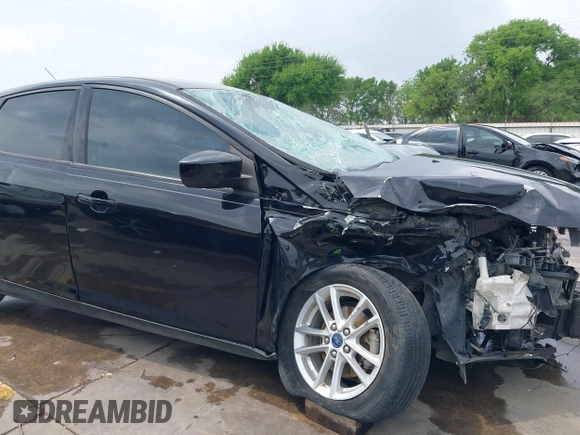 2018 Ford Focus SE with VIN 1FADP3F22JL311975, listed as a IAAI auction lot 41934856 with 68,974 mi miles. Bid and sale history available at carsss.com. Image 18.