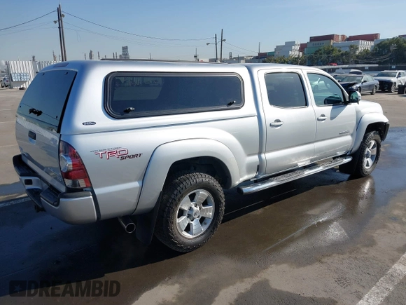 2013 Toyota Tacoma PreRunner with VIN 3TMKU4HN8DM034338, listed as a IAAI auction lot 41808842 with 142,012 mi miles and . Bid and sale history available at DreamBid. Image 4.