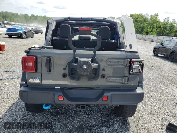 2022 Jeep Wrangler Unlimited Rubicon with VIN 1C4JJXR69NW206276, listed as a Copart auction lot 55247595 with 39,273 mi miles and Salvage title. Bid and sale history available at DreamBid. Image 6.