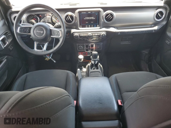 2023 Jeep Wrangler Rubicon z VIN 1C4JJXR65PW557849, wystawiony jako Copart lot #57845705 z przebiegiem 21 849 mil mil oraz Szkoda całkowita • Salvage title. Historia ofert i sprzedaży dostępna na DreamBid. Obrazek 8.