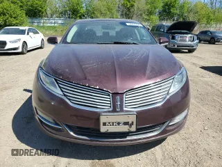 2013 Lincoln MKZ z VIN 3LN6L2J9XDR817262, wystawiony jako Copart lot #56455825 z przebiegiem 173 367 mil mil oraz Tytuł czysty. Historia ofert i sprzedaży dostępna na DreamBid. Obrazek 5.