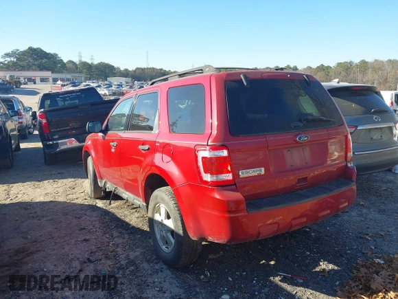 2011 Ford Escape XLT with VIN 1FMCU0D76BKB89698, listed as a IAAI auction lot 41073661 with 124,479 mi miles. Bid and sale history available at carsss.com. Image 3.