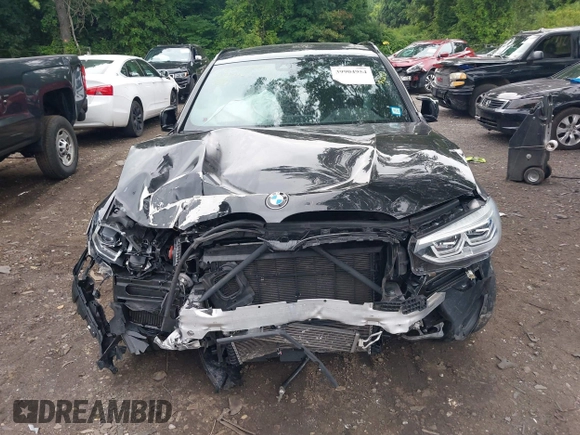 2021 BMW X3 M z VIN 5YMTS0C09M9E42418, wystawiony jako IAAI lot #39904954 z przebiegiem Nie podano mil oraz . Historia ofert i sprzedaży dostępna na DreamBid. Obrazek 11.