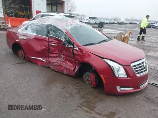 2013 Cadillac XTS Luxury with VIN 2G61R5S30D9157654, listed as a IAAI auction lot 41336844 with 159,419 mi miles. Bid and sale history available at carsss.com. Image 1.
