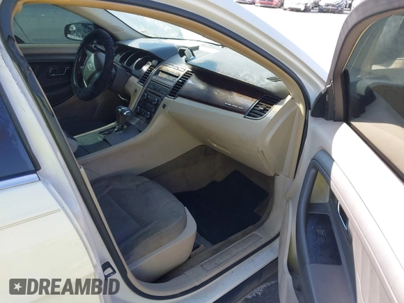 2012 Ford Taurus SEL with VIN 1FAHP2EW0CG108336, listed as a IAAI auction lot 41801077 with 229,387 mi miles and . Bid and sale history available at DreamBid. Image 5.