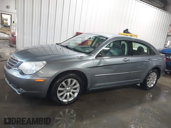 2010 Chrysler Sebring Limited z VIN 1C3CC5FD8AN134758, wystawiony jako IAAI lot #41190558 z przebiegiem 259 904 mil mil oraz . Historia ofert i sprzedaży dostępna na DreamBid. Obrazek 14.