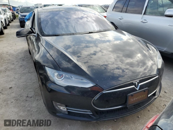 2016 Tesla Model S 90D с VIN 5YJSA1E27GF125739, выставлен на аукционе Copart как лот 75074624 с пробегом Не указан миль и Списание • Salvage title. История ставок и продаж доступна на DreamBid. Изображение 5.