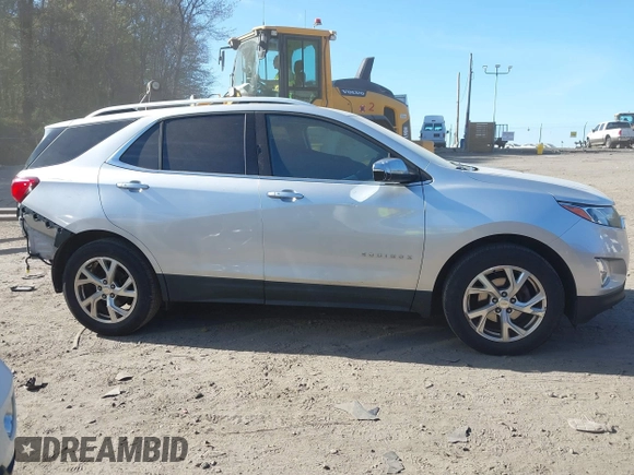 2018 Chevrolet Equinox Premier with VIN 3GNAXVEV4JS598239, listed as a IAAI auction lot 42112886 with 142,093 mi miles and . Bid and sale history available at DreamBid. Image 14.