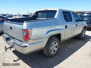 2012 Honda Ridgeline RT with VIN 5FPYK1F23CB456955, listed as a IAAI auction lot 41765075 with 187,989 mi miles. Bid and sale history available at carsss.com. Image 4.