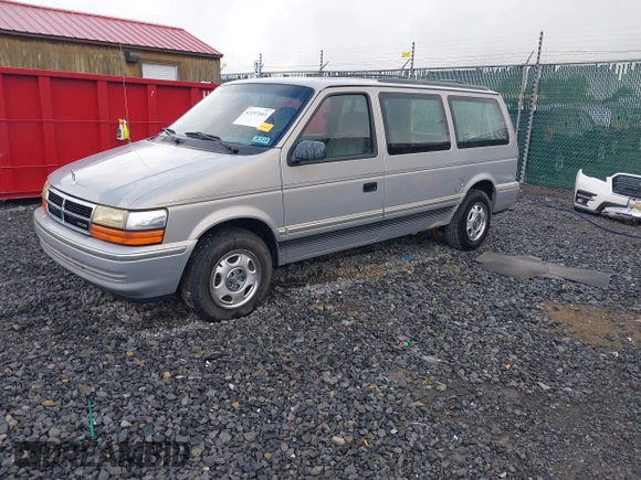 1992 Dodge Caravan Grand SE z VIN 1B4GH44R5NX258694, wystawiony jako IAAI lot #42197603 z przebiegiem 152 591 mil mil oraz . Historia ofert i sprzedaży dostępna na DreamBid. Obrazek 2.