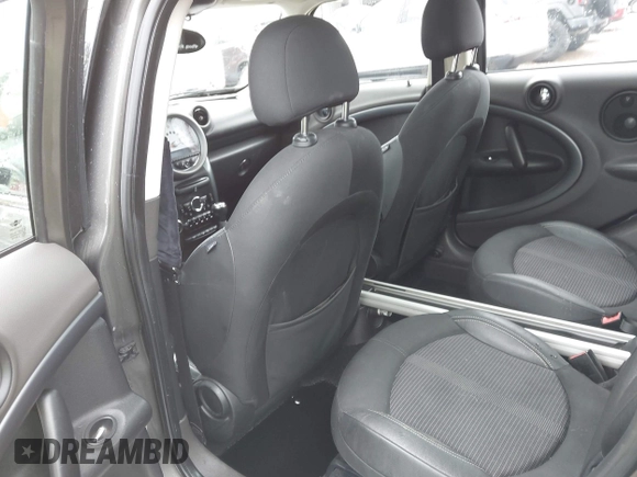 2011 MINI Countryman S with VIN WMWZC5C53BWM11022, listed as a IAAI auction lot 42249403 with 173,718 mi miles and . Bid and sale history available at DreamBid. Image 8.
