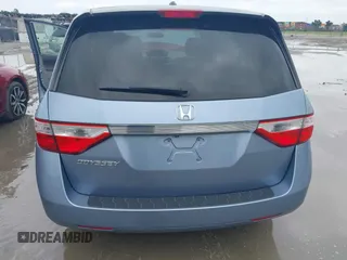 2013 Honda Odyssey EX-L с VIN 5FNRL5H6XDB090432, выставлен на аукционе IAAI как лот 42468409 с пробегом Не указан миль и . История ставок и продаж доступна на DreamBid. Изображение 6.