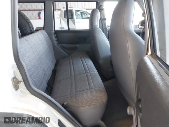 1997 Jeep Cherokee Sport with VIN 1J4FJ68S4VL584953, listed as a IAAI auction lot 42696694 with 135,545 mi miles and . Bid and sale history available at DreamBid. Image 8.