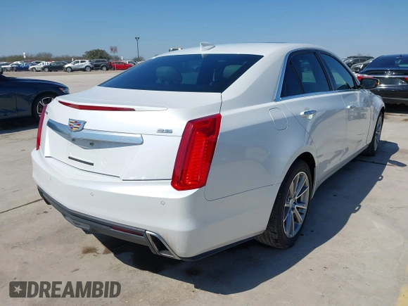 2017 Cadillac CTS Luxury RWD with VIN 1G6AR5SS7H0145637, listed as a IAAI auction lot 41689827 with 54,576 mi miles and . Bid and sale history available at DreamBid. Image 4.