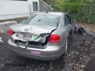 2013 Volkswagen Passat SE with VIN 1VWBP7A33DC041410, listed as a IAAI auction lot 42427033 with Not provided miles and . Bid and sale history available at DreamBid. Image 4.