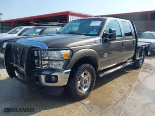 2015 Ford Super Duty F-250 SRW Lariat with VIN 1FT7W2BT8FED53078, listed as a IAAI auction lot 41957641 with 305,396 mi miles. Bid and sale history available at carsss.com. Image 2.