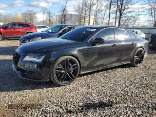 2014 Audi S7 Prestige with VIN WAUW2AFC1EN006649, listed as a Copart auction lot 80269974 with 147,279 mi miles and Salvage Title. Bid and sale history available at carsss.com. Image 1.