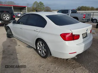 2015 BMW 3 Series 320i with VIN WBA3B1G56FNT64298, listed as a IAAI auction lot 41695116 with 125,926 mi miles. Bid and sale history available at carsss.com. Image 3.