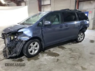 2015 Toyota Sienna LE AAS with VIN 5TDKK3DC3FS564689, listed as a Copart auction lot 86733014 with 149,675 mi miles and Salvage title. Bid and sale history available at DreamBid. Image 1.