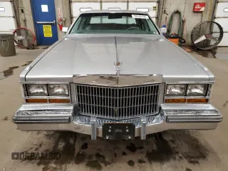 1980 Cadillac Seville z VIN 6S69NAE688845, wystawiony jako Copart lot #78749194 z przebiegiem 66 974 mil mil oraz Tytuł czysty. Historia ofert i sprzedaży dostępna na DreamBid. Obrazek 5.
