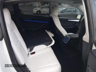 2023 Tesla Model Y Performance with VIN 7SAYGDEF4PF738885, listed as a IAAI auction lot 41798997 with 59,270 mi miles and . Bid and sale history available at DreamBid. Image 8.