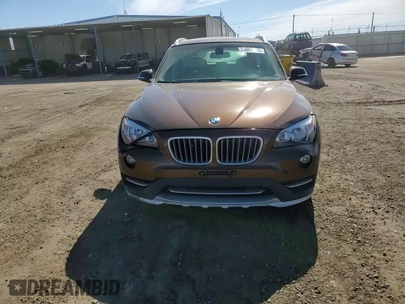 2015 BMW X1 xDrive28i z VIN WBAVL1C5XFVY35610, wystawiony jako Copart lot #54063125 z przebiegiem 115 279 mil mil oraz Szkoda całkowita • Salvage title. Historia ofert i sprzedaży dostępna na DreamBid. Obrazek 13.