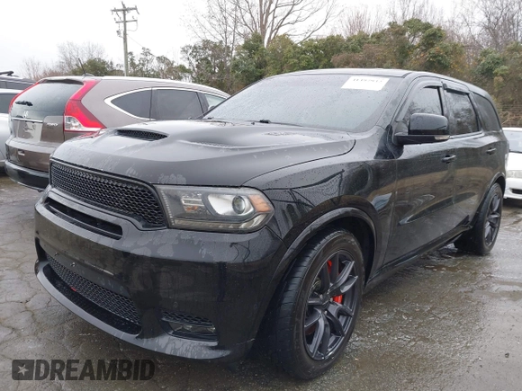 2019 Dodge Durango SRT with VIN 1C4SDJGJXKC550910, listed as a IAAI auction lot 41497932 with 62,541 mi miles and . Bid and sale history available at DreamBid. Image 17.