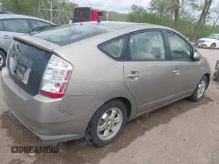 2007 Toyota Prius z VIN JTDKB20U477682965, wystawiony jako IAAI lot #42171167 z przebiegiem 257 780 mil mil oraz . Historia ofert i sprzedaży dostępna na DreamBid. Obrazek 4.