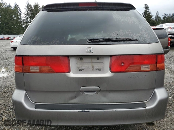 1999 Honda Odyssey EX z VIN 2HKRL1865XH536405, wystawiony jako Copart lot #52183875 z przebiegiem 237 660 mil mil oraz Szkoda całkowita • Salvage title. Historia ofert i sprzedaży dostępna na DreamBid. Obrazek 6.