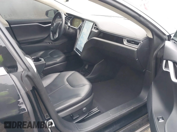 2014 Tesla Model S 60 with VIN 5YJSA1H1XEFP36008, listed as a IAAI auction lot 41287240 with 48,171 mi miles and . Bid and sale history available at DreamBid. Image 5.