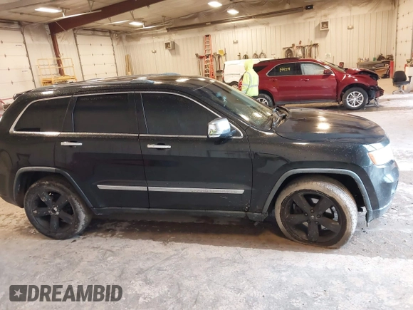 2011 Jeep Grand Cherokee Limited with VIN 1J4RR5GTXBC586647, listed as a IAAI auction lot 42332615 with 151,377 mi miles and . Bid and sale history available at DreamBid. Image 13.