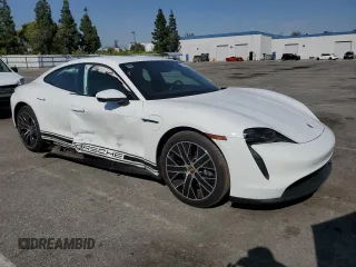 2021 Porsche Taycan z VIN WP0AA2Y15MSA17464, wystawiony jako Copart lot #52412815 z przebiegiem 27 136 mil mil oraz Szkoda całkowita • Salvage title. Historia ofert i sprzedaży dostępna na DreamBid. Obrazek 4.