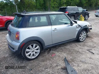 2007 MINI Hardtop S with VIN WMWMF73537TL88038, listed as a IAAI auction lot 42200252 with 70,603 mi miles and . Bid and sale history available at DreamBid. Image 4.