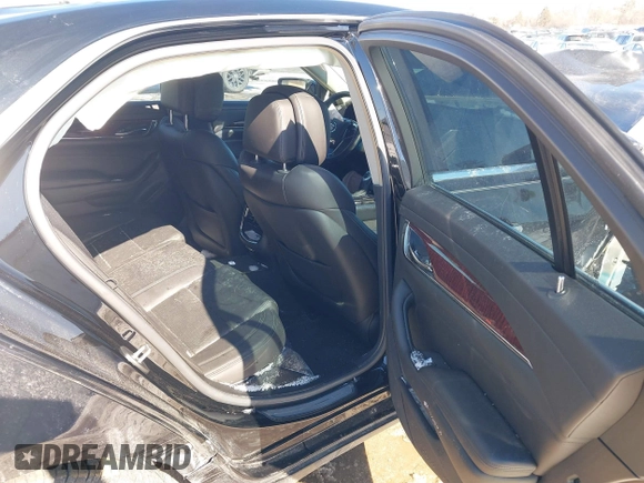2014 Cadillac CTS Luxury AWD with VIN 1G6AX5SX3E0191673, listed as a IAAI auction lot 41617087 with 68,581 mi miles and . Bid and sale history available at DreamBid. Image 8.