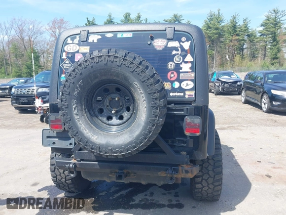 2005 Jeep Wrangler X z VIN 1J4FA39S45P382880, wystawiony jako IAAI lot #42129610 z przebiegiem 191 864 mil mil oraz . Historia ofert i sprzedaży dostępna na DreamBid. Obrazek 16.